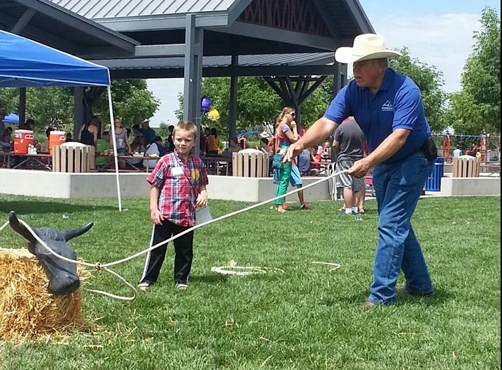 Terry Fuhriman at BBBS Teaching kid how to rope